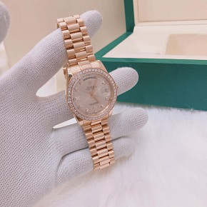 Rolex President Day Date Gold Rose 118235